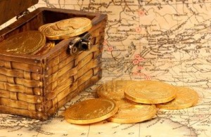 297611-treasure-chest-with-gold-coins-on-a-map